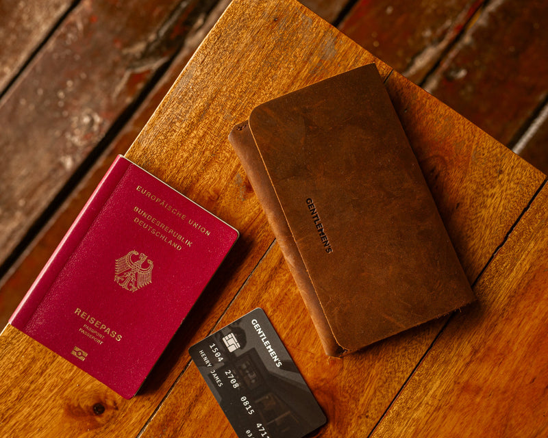 Passport cover from Gentlemen's with space for 2 passports, 2 credit cards and a vaccination card.